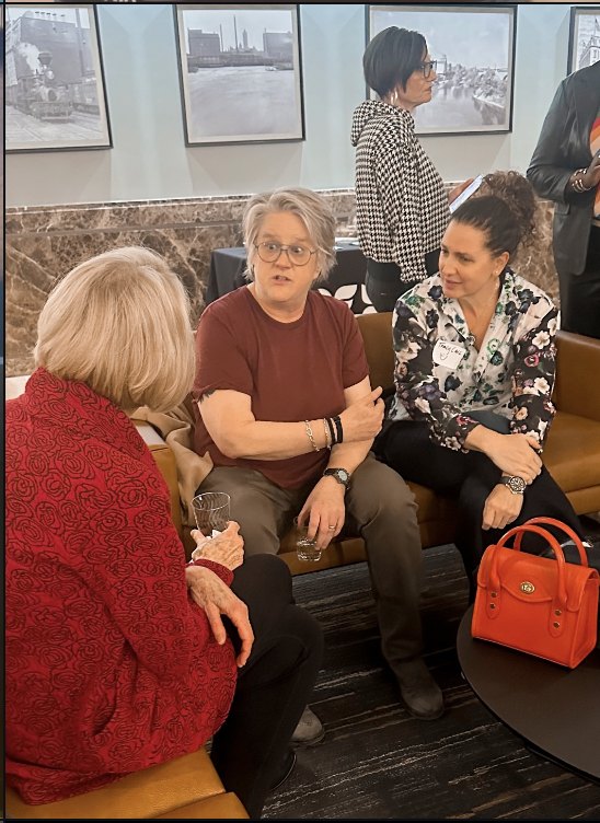 Deep in conversation at an event