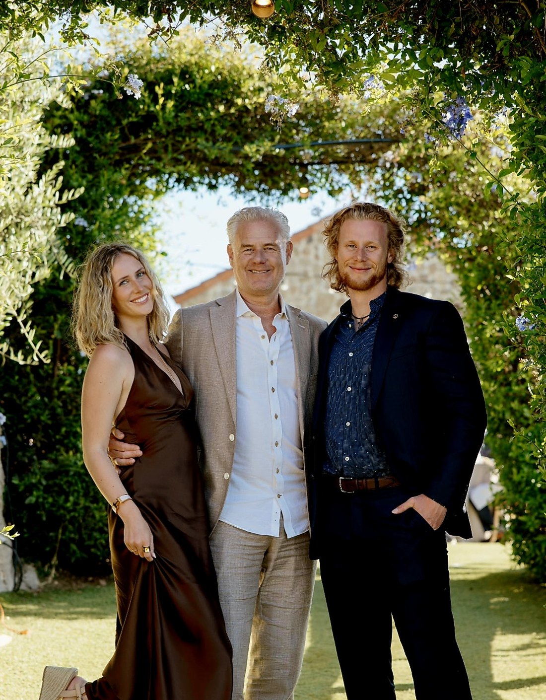 Brian Seesz with Avery and Dalton at an outdoor celebration